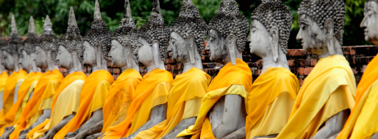 Lying Buddha Dressed in Yellow Scarf