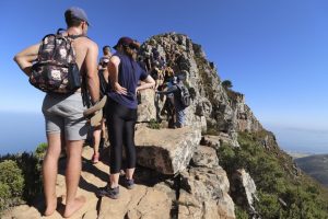 Cape Town, South Africa – December 23, 2019: Overcrowding and overtourism on Lion's Head mountain in Cape Town.
