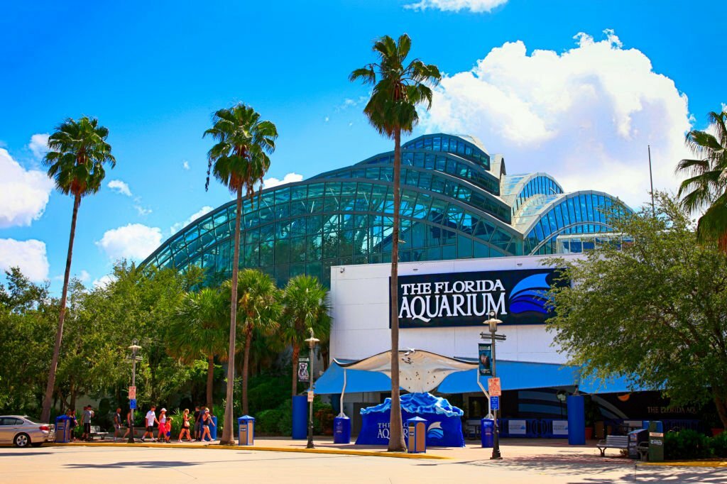 People outside the Florida Aquarium building in Tampa FL, USA