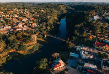 Aerial photos of the twin towns of Santa Elena and San Ignacio, joined by the Hawkesworth Bridge, Belize's longest suspension bridge.